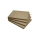 Plaques de vermiculite Alaska beige empilées pour isolation thermique de poêle à bois