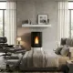 Poêle à granulés Katia noir 11 kW allumé dans un salon moderne avec cheminée décorative