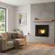 Insert à pellets canalisable Comfort P70 Air Plus 10 kW intégré dans un mur moderne