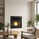 Insert à granulés Firebox Linea VZ 10 kW encastré dans mur de salon contemporain